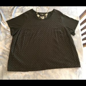 Super Stylish Black Top with design on front.